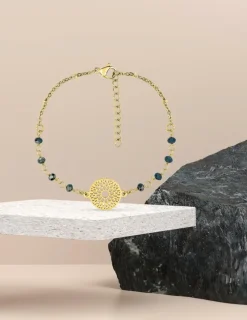 Bracelet fantaisie cristal bleu, petite chaîne en acier doré et motif SO OR