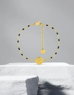Bracelet fantaisie noir, acier doré et motif plaque ronde SO OR