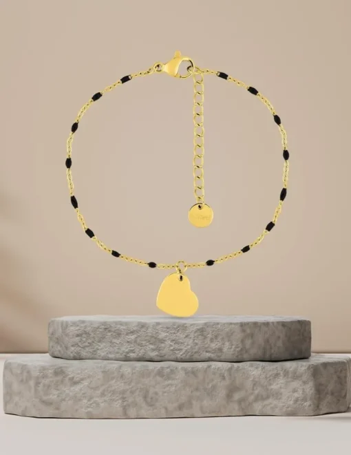 Bracelet fantaisie noir et acier doré, breloque cœur SO OR