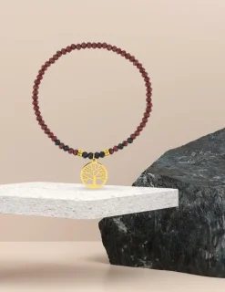 Bracelet élastique cristal rouge et acier doré SO OR