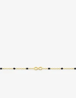 Bracelet motif infini en acier doré et résine noire SO OR