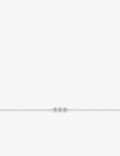 Bracelet or blanc 750‰ et trilogie oxydes de zirconium sertis clos SO OR