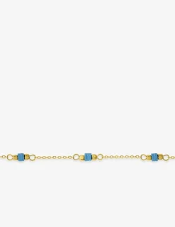 Chaine pour cheville en acier doré et perles synthétiques bleues SO OR