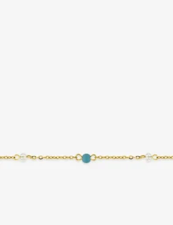 Chaîne de cheville en acier doré et turquoises synthétiques SO OR