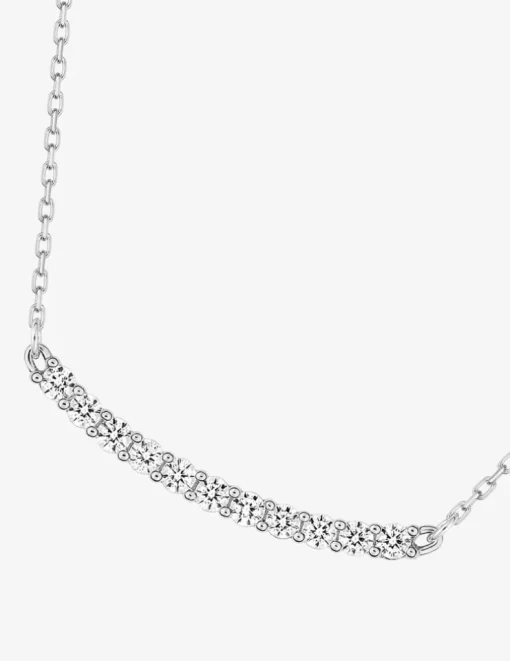 Collier barette en or blanc 375 ‰ et oxydes de zirconium sertis griffes SO OR