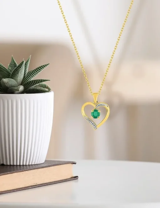 Collier cœur or jaune 375‰, émeraude SO OR