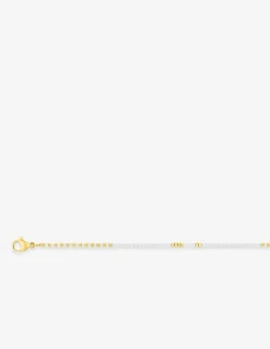 Collier en acier doré, détails blancs SO OR