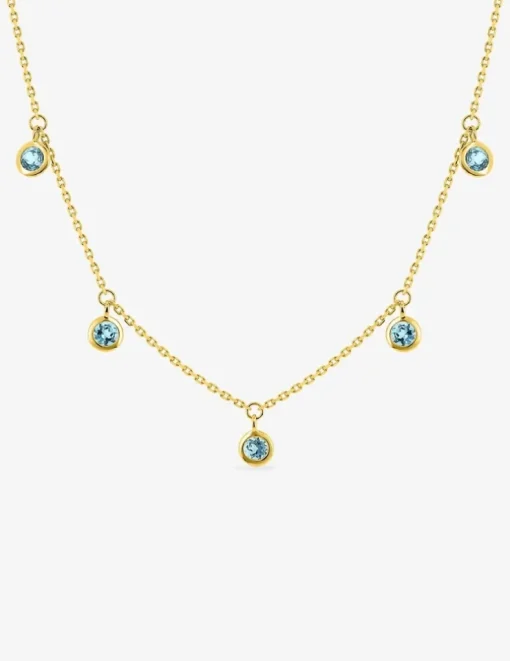Collier en or jaune 375‰ et topazes bleues SO OR