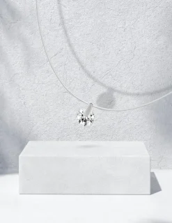 Collier fil nylon avec oxyde percé serti sur or blanc 375 ‰ SO OR