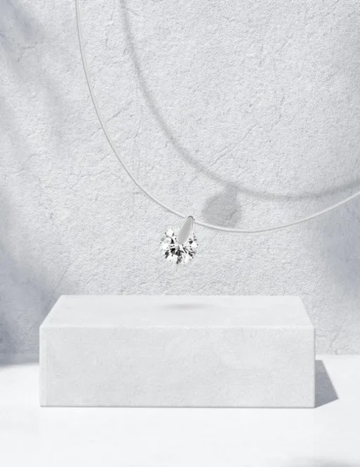Collier fil nylon avec oxyde percé serti sur or blanc 375 ‰ SO OR