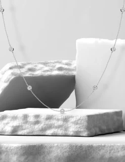 Collier or blanc 375‰ et oxydes de zirconium serti clos SO OR
