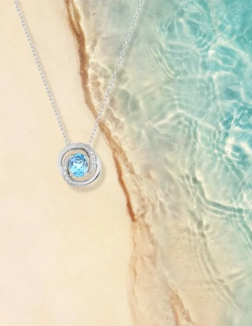 Collier or blanc 375‰ et topaze enroulée SO OR