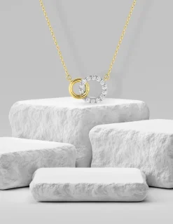 Collier or jaune 375 ‰ deux cercles entrelacés en et oxydes de zirconium avec rhodium SO OR