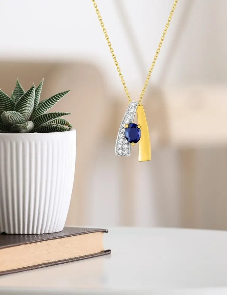Collier or jaune bicolore 375‰, saphir et oxyde de zirconium SO OR
