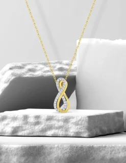 Collier pendentif en or jaune 375 ‰ et rhodié, avec oxydes de zirconium SO OR
