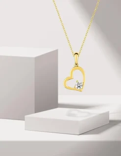 Pendentif cœur or jaune 375 ‰ et oxyde de zirconium quatre griffes SO OR