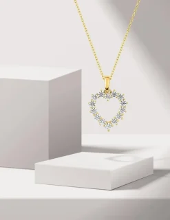 Pendentif cœur or jaune 375 ‰ pavé d'oxydes de zirconium SO OR