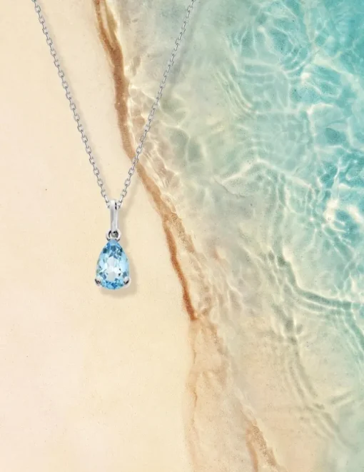 Pendentif or blanc 375‰ et topaze poire SO OR