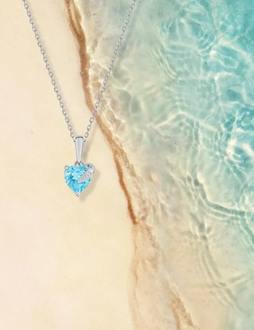 Pendentif or blanc 375‰ et topaze cœur SO OR