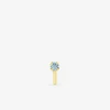 Piercing de nez or jaune 750 ‰ et topaze bleue traitée SO OR