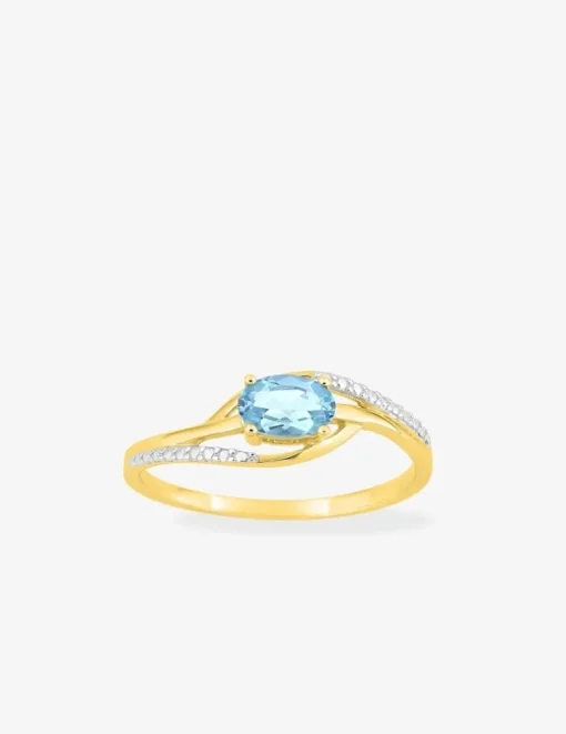 Solitaire fantaisie or jaune 375‰, rhodium, topaze et oxydes de zirconium SO OR